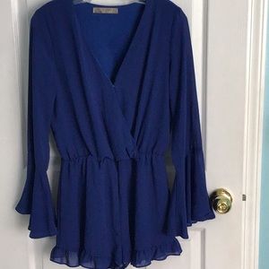 Entro Women’s LS Bright Blue Romper. Size medium